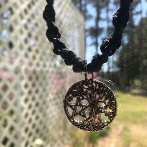 This is a handmade black hemp necklace. Made special by me ❤️.